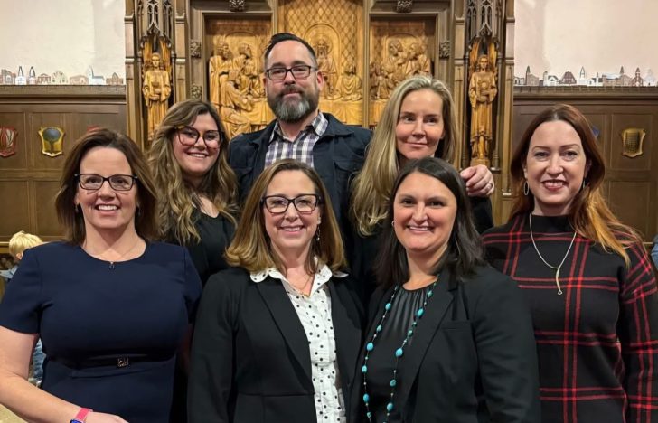 Chris Andoe with the presenters at the LGBTQ Legal Summit. Sara Marler, Tammy Repaso, Ramona Gau, Krystal Weigl, Joanna Beck Wilkinson, Mary Beck and Amanda Diamond.